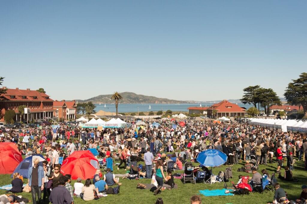A view of the Parade Grounds at the Presidio with a large event going on