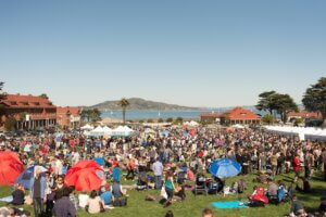 A view of the Parade Grounds at the Presidio with a large event going on